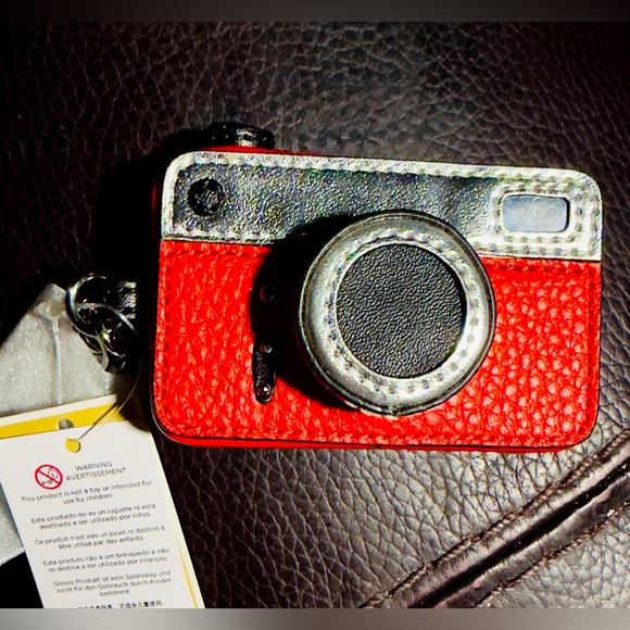 Michael Kors Accessories - 👛 RESERVED aposher. Michael Kors Red and Silver Camera Charm Keychain. Leather